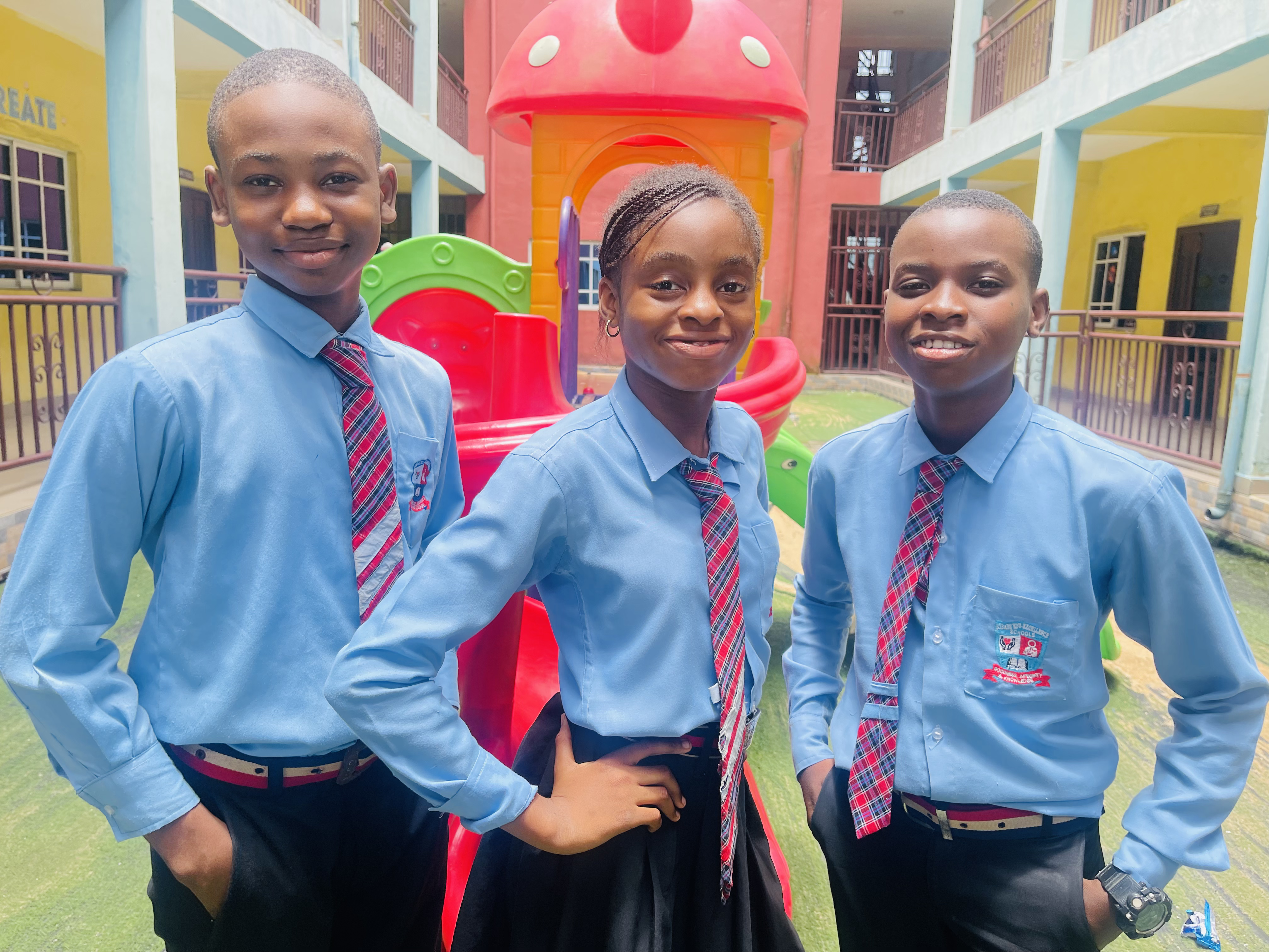 BOBAES pupils in uniform in the school courtyard